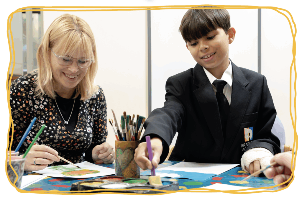 Child with mum in art therapy session