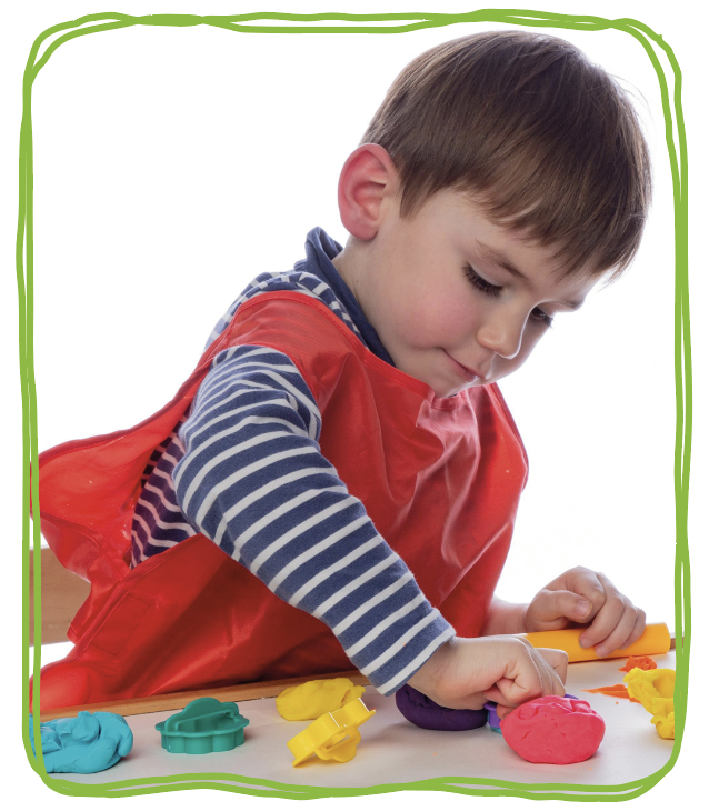 boy playing with playdough