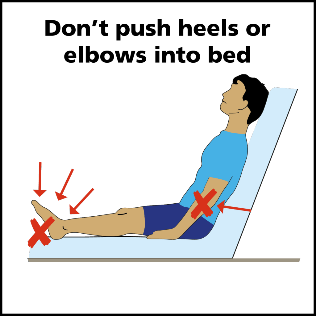 Man on bed with crosses by heels and elbows
