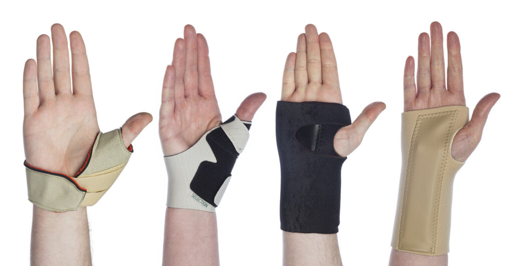 Image shows a row of hands wearing a selection of soft splints